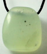 Set of 12 jade pendants featuring unique designs for spiritual healing, Zodiac energies, balance, and prosperity.