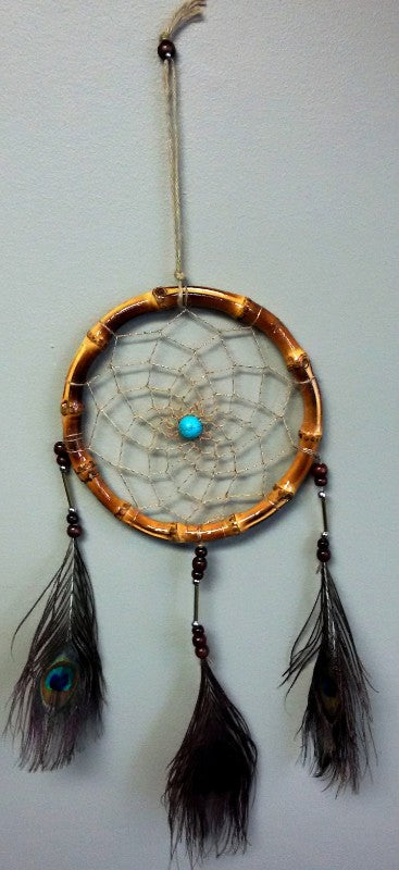 Handcrafted 17cm peacock-inspired dreamcatcher with vibrant feathers, promoting positivity and tranquility in your space.