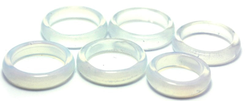 Colorful collection of 100 unique Mini Moonstone Rings in mixed sizes, showcasing their natural beauty and spiritual qualities.