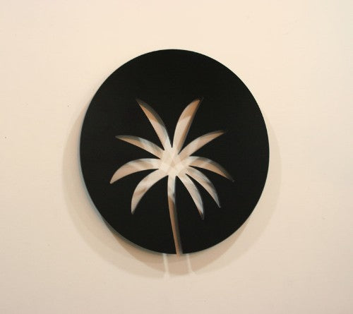 Stunning Cabbage Tree wall art in a 300mm circle, blending contemporary design with New Zealand's natural beauty.