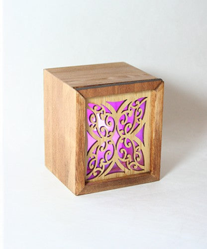 LED Tealight Candle Box in Kowhaiwhai design made of bamboo, featuring color-changing LED candles for a stylish, eco-friendly decor.