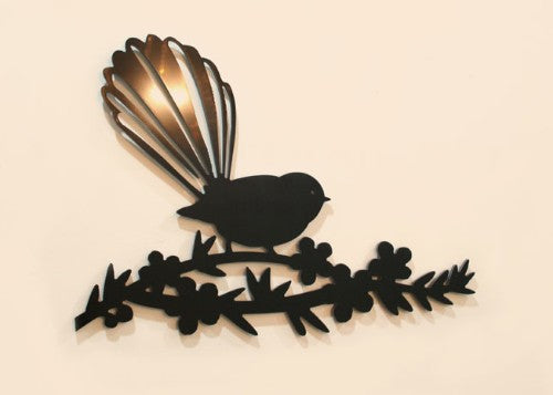 Kiwiana Wall Art featuring a Fantail on vibrant Manuka flowers, crafted from durable Black ACM, perfect for any space.