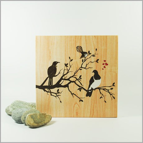 Plywood art block featuring birds on a tree, crafted from eco-friendly pine, ready to hang for nature-inspired decor.