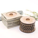 Round trinket box made from NZ Beech veneer featuring a Tui bird on Manuka blossoms, perfect for storing keepsakes.