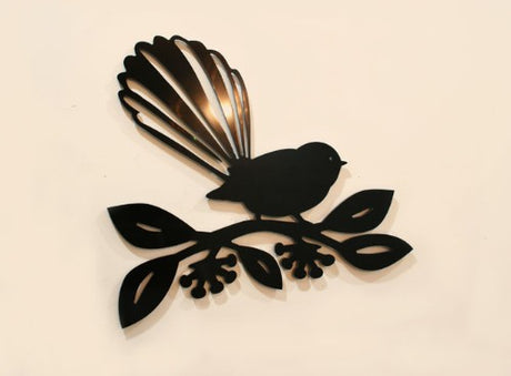 Kiwiana Wall Art depicting a Fantail on a vibrant Pohutukawa tree, crafted from durable Black ACM material.