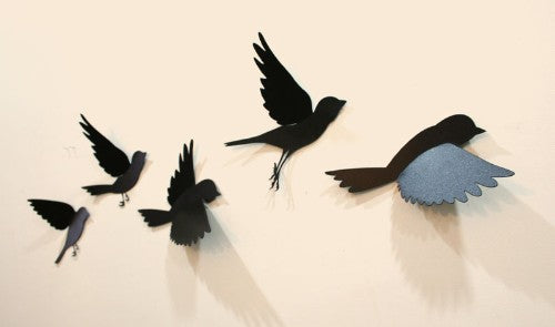 Elegant polypropylene sparrow wall art in flight, featuring vibrant colors and intricate design for home or office decor.