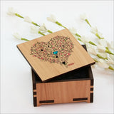 Small trinket box made from NZ Silver Beech veneer with colorful paua inlay, ideal for jewelry and keepsakes.