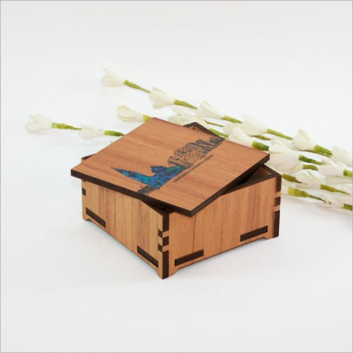 Small trinket box made from NZ Silver Beech veneer with vibrant paua inlay, perfect for jewelry and keepsakes.