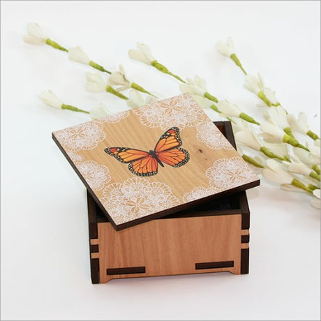 Elegant small trinket box in NZ Silver Beech veneer, perfect for storing jewelry and keepsakes. Measures 80mm x 80mm x 40mm.