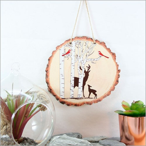 Beautiful wood slice wall art featuring a detailed deer in a serene woodland setting, crafted from durable 4mm veneer.