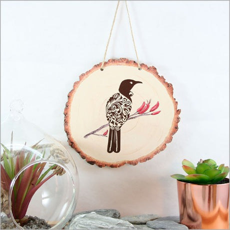 Wood slice wall art featuring intricately designed Tui, crafted from high-quality veneer, ready to hang.