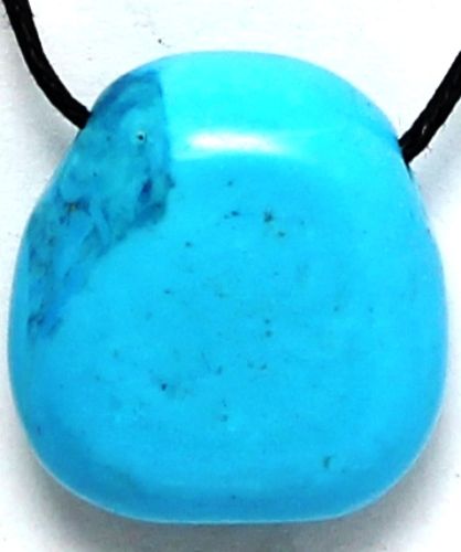 Set of 12 unique Howlite and Turquoise pendants showcasing spiritual and healing properties for jewelry enthusiasts.