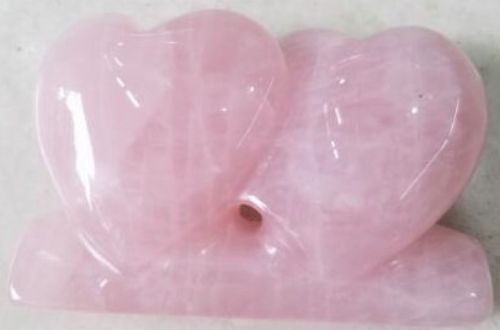 Beautiful 5cm rose quartz heart, promoting love and peace, ideal for meditation and home decor.