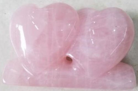 Beautiful 5cm rose quartz heart, promoting love and peace, ideal for meditation and home decor.