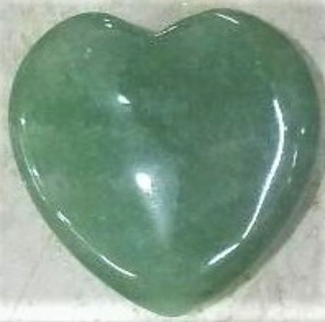 A 4cm carved aventurine heart promoting calmness, energy balance, and perfect for healing or decorative use.