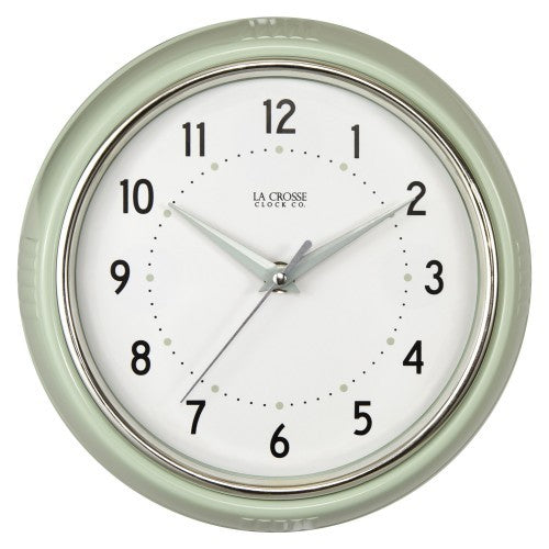 Vintage-inspired La Crosse wall clock with chrome bezel, Arabic numbers, and sweeping second hand in a retro diner style.