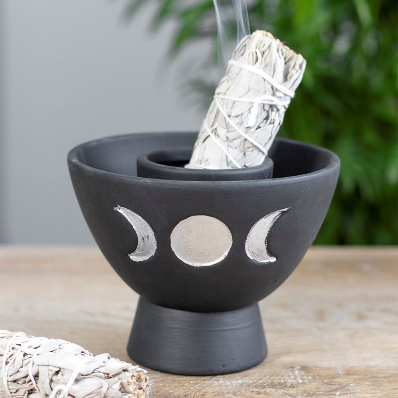 Black terracotta smudge bowl featuring a white triple moon design, ideal for smudging rituals and home decor.