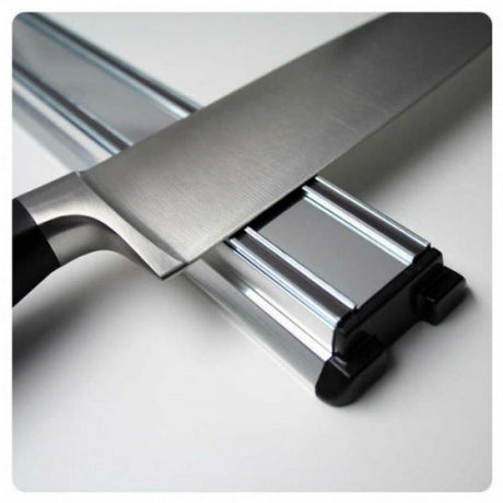 Sleek silver magnetic knife rack, 300mm, securely holds knives and utensils for organized kitchen storage.