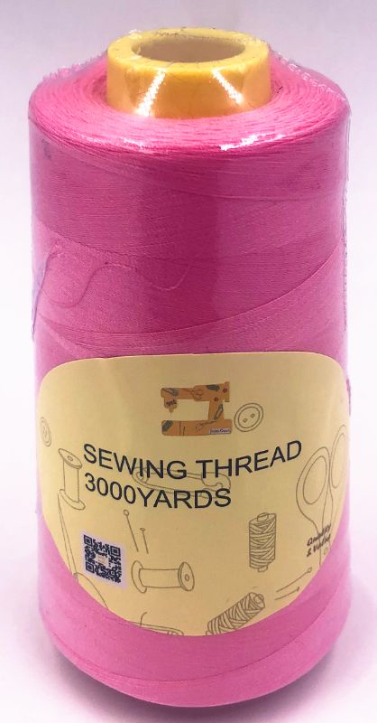 Set of 12 pink sewing thread spools, each 3000 yards, perfect for quilting, embroidery, and various sewing projects.