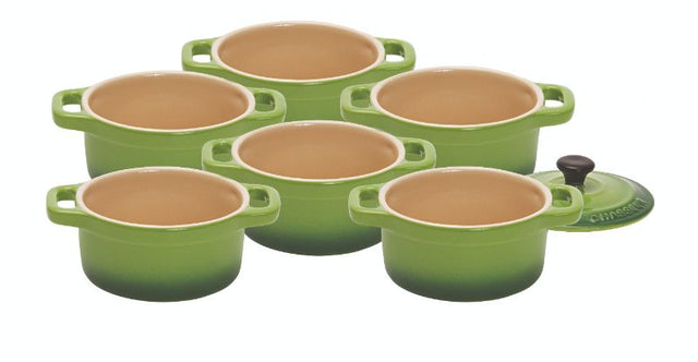 Charming Apple-colored mini cocotte set for versatile baking, serving, and storing; microwave, oven, and dishwasher safe.