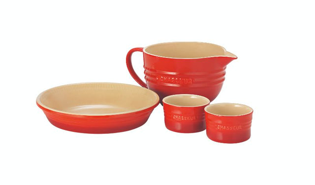 Vibrant red 4-piece baking set with ramekins, mixing jug, and pie dish, crafted from oven-safe stoneware for versatile cooking.