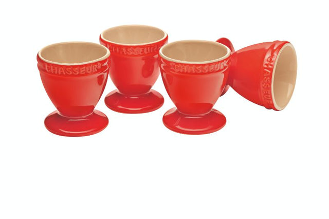 Set of 4 vibrant red stoneware egg cups, perfect for serving soft-boiled and poached eggs, microwave and dishwasher safe.