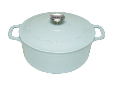 Round Duck Egg Blue cast-iron French oven, ideal for slow cooking, with self-basting lid and vibrant handcrafted finish.