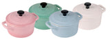 Four pastel mini cocottes in Cherry Blossom, Peppermint, Duck Egg Blue, and Antique Cream, perfect for serving individual portions.