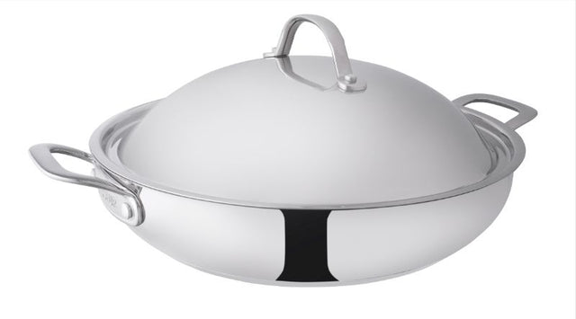 High-quality 32cm stainless steel chef pan with aluminum base, curved handles, and elegant design for versatile cooking.