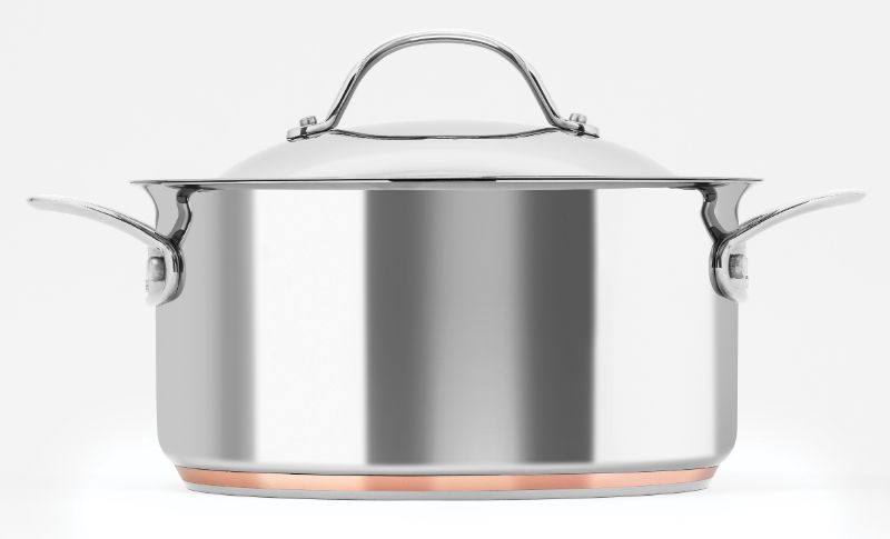 Elegant 5.2L casserole with a copper core, stainless steel exterior, domed lid, and ergonomic handles for versatile cooking.