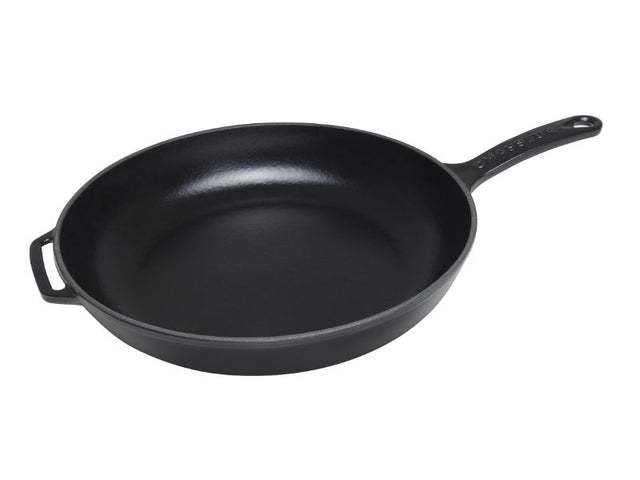 Fry pan with cast handle in matte black, crafted in France, induction-compatible, and oven-safe up to 250°C for versatile cooking.