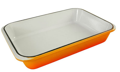 Rectangular cast-iron roasting pan in Sunset color, ideal for oven and stovetop cooking, handcrafted in France.