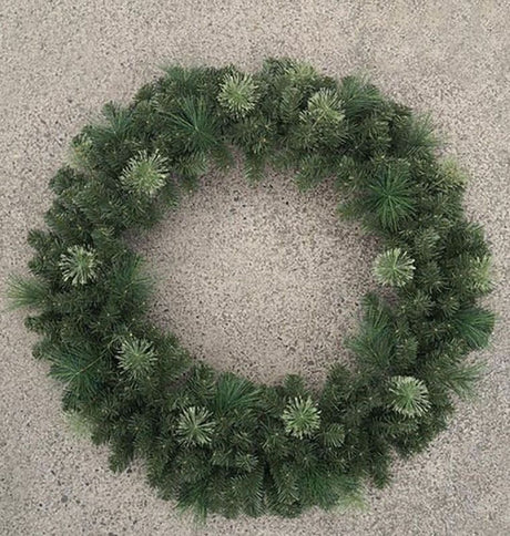 Lifelike 48" Flowering Pine Wreath featuring pine needles and floral accents, perfect for year-round home decor.