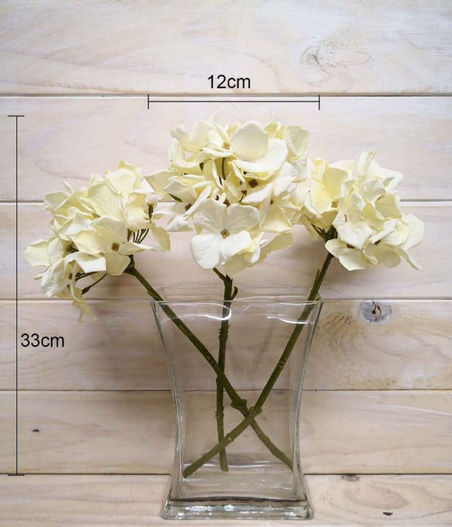 Cream artificial hydrangea stem, 33cm long, perfect for low-maintenance home decor or elegant floral arrangements.