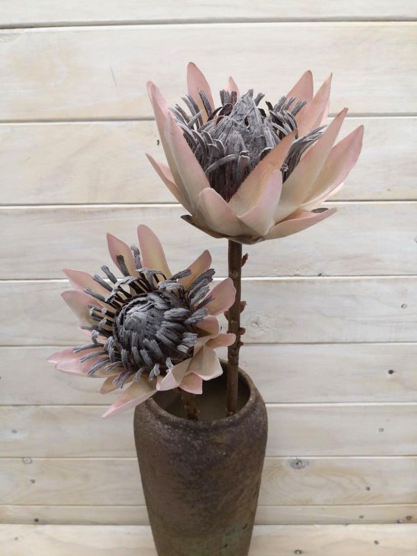 Artificial pink King Protea with a dry look, 12 cm wide head, 9 cm tall, and 48 cm long for elegant home decor.