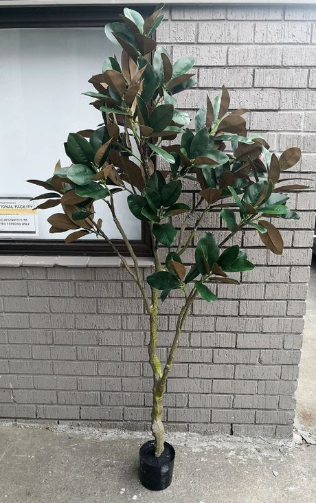 Lifelike 1.8m Artificial Magnolia Tree with vibrant blooms and lush leaves, ideal for home or event decor without maintenance.