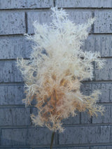 Artificial peach moss spray showcasing lush texture, perfect for decorations, floral arrangements, and DIY projects.