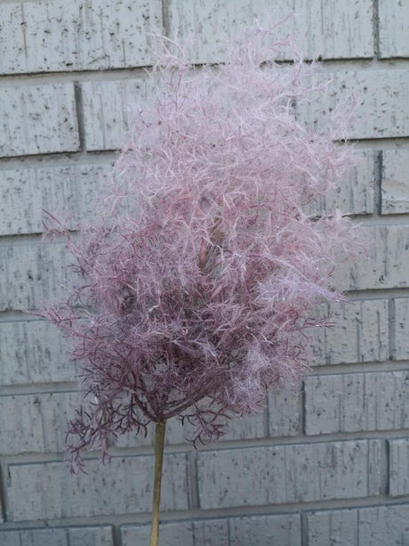 Vibrant purple artificial moss spray, perfect for home decor, crafting, and floral arrangements with realistic texture.