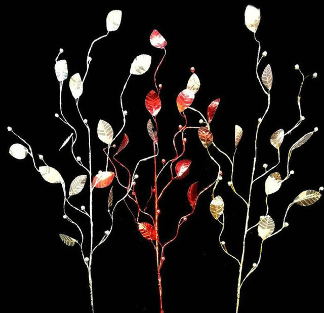 Vibrant red artificial leaf spray with beads, perfect for home decor and events, adding charm without maintenance.