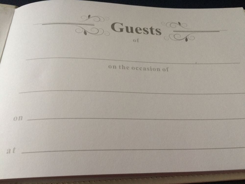 Elegant Christening Day Guest Book with padded hard cover, customizable metal plaque, and ample space for heartfelt messages.