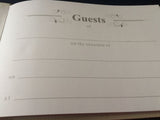 Elegant Christening Day Guest Book with padded hard cover, customizable metal plaque, and ample space for heartfelt messages.