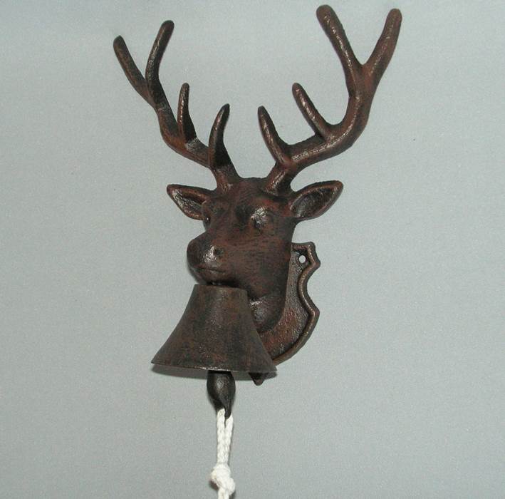 Rustic metal doorbell featuring a charming deer design, crafted from durable wrought iron for indoor and outdoor use.