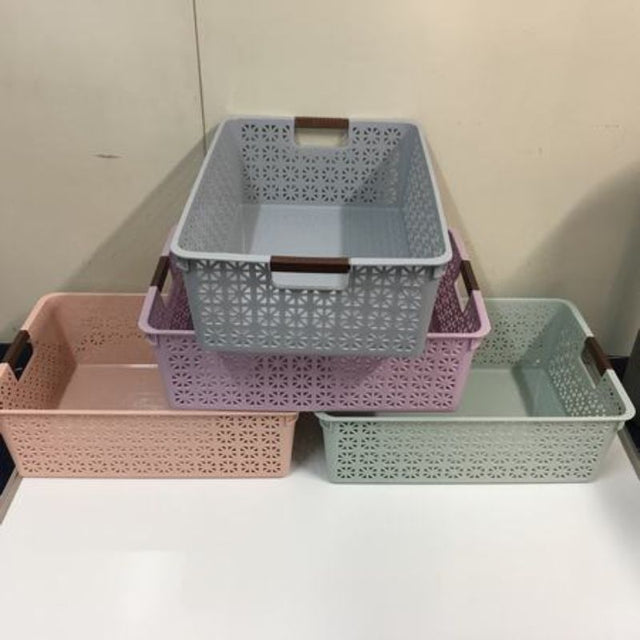 Set of 12 assorted plastic baskets (42 x 29 x 14cm) for stylish and versatile home organization in vibrant colors.