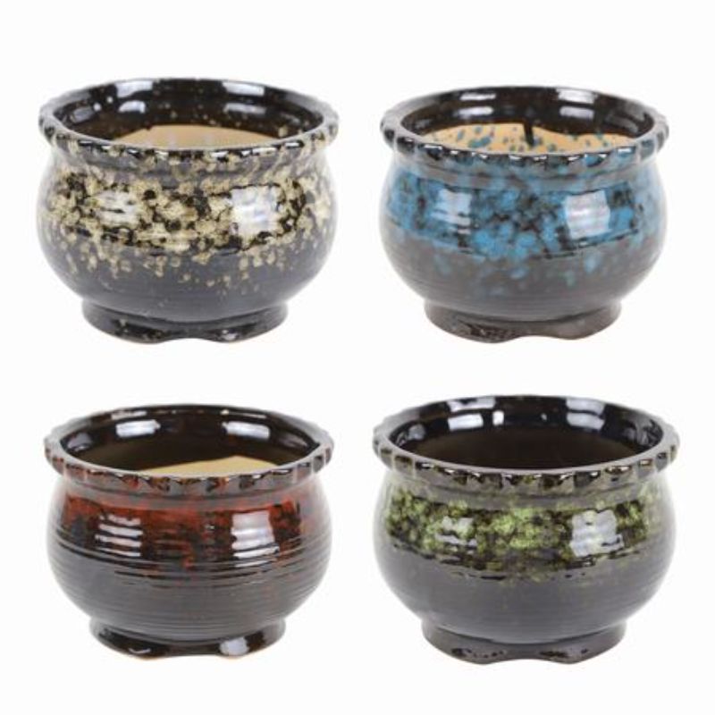 Set of 4 assorted ceramic pots, ideal for indoor plants with unique designs and durable craftsmanship, 13cm x 9.5cm each.