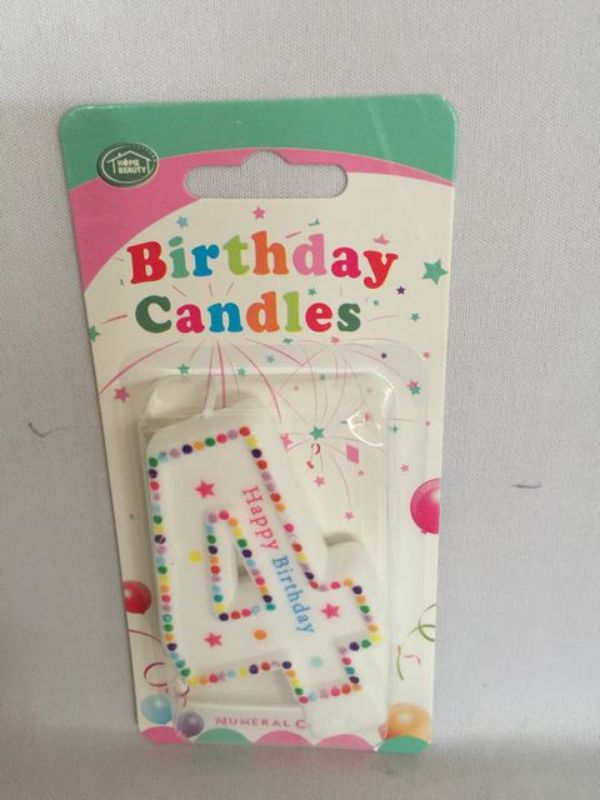 Vibrant 4-inch birthday candles in assorted colors, perfect for adding joy to any celebration or event. Set of 12.