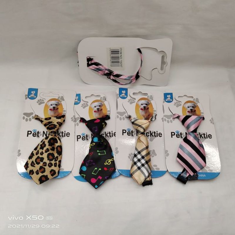 Set of 12 assorted pet neckties in various colors and patterns, ideal for special occasions and stylish pet attire.