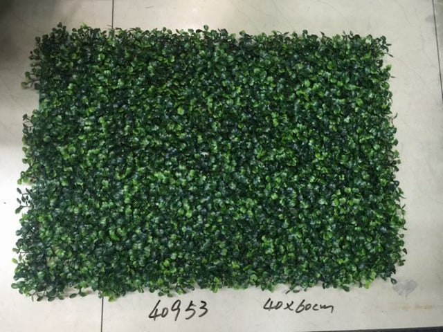 Set of 12 artificial lawn pieces, each 40 x 60cm, ideal for indoor and outdoor spaces with a realistic green appearance.