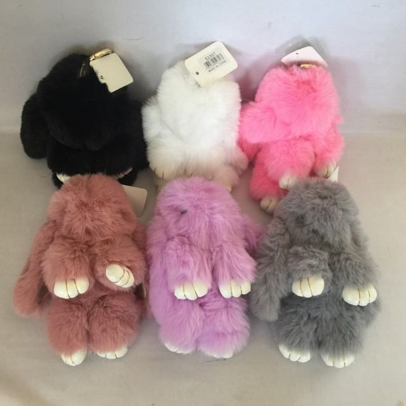 Set of 12 soft toy keyrings offering playful designs, perfect for kids and adults, ideal for gifting or collecting.