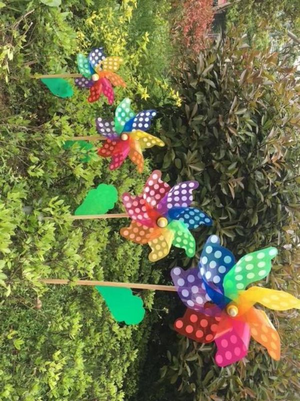 Set of 12 whimsical 42cm windmills, perfect for outdoor decor, parties, or as charming centerpieces.