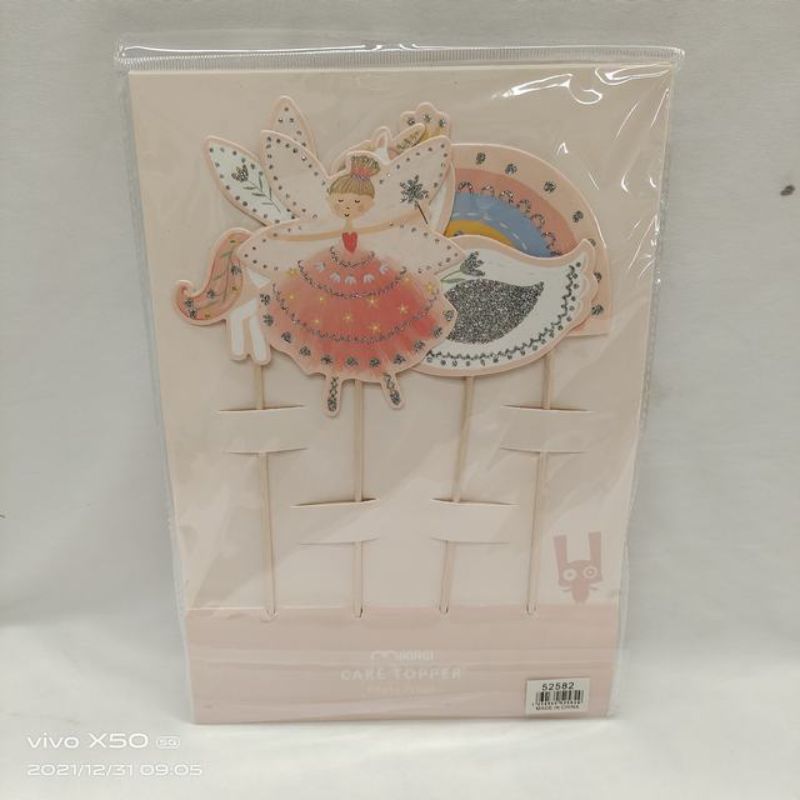 Colorful fairy-themed party decorations, including banners and centerpieces, perfect for creating a whimsical celebration.